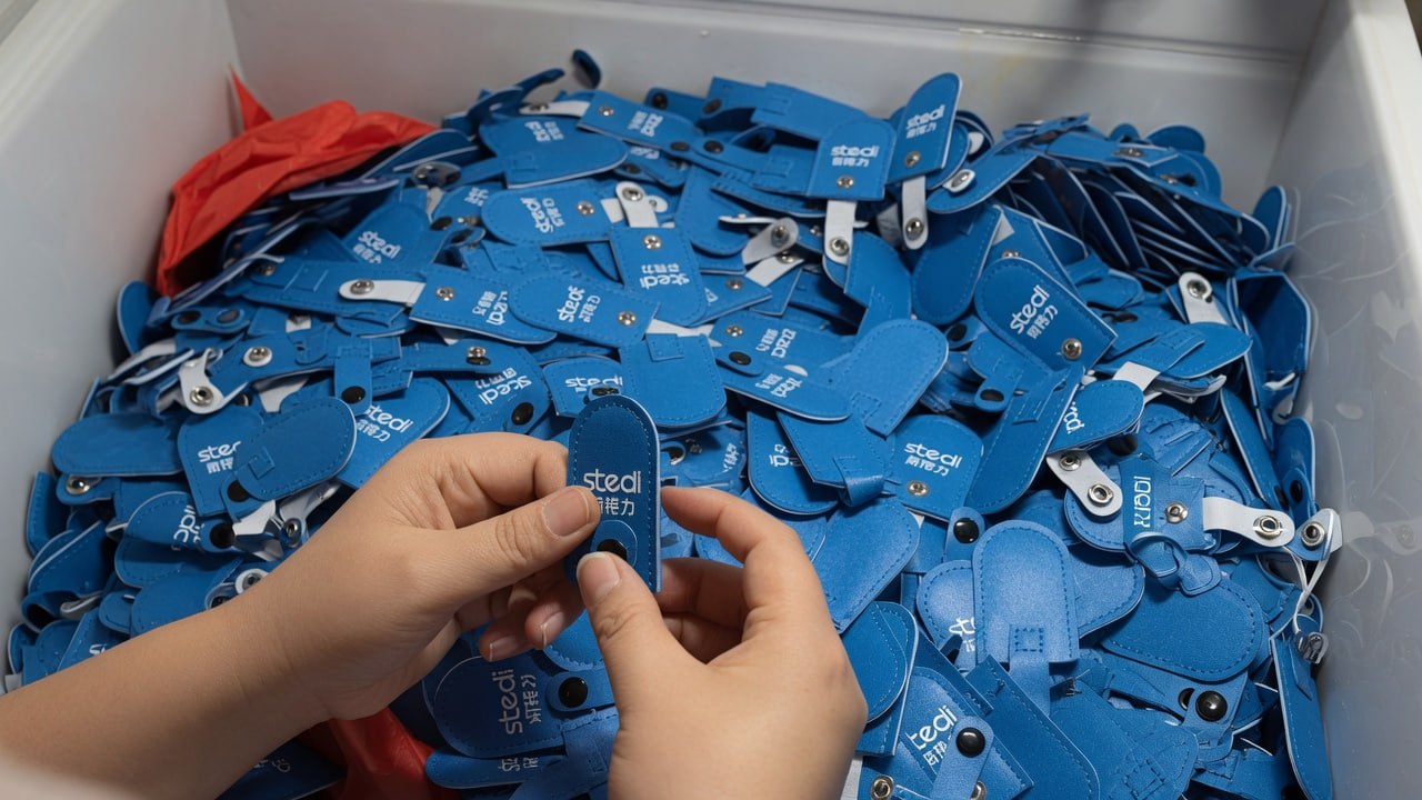 Parcel being packaged for shipping at a home workspace