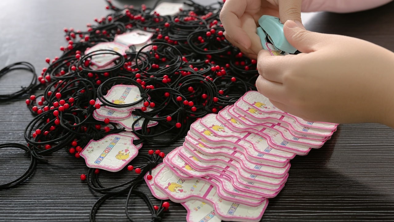 Colorful craft supplies and materials on a wooden table