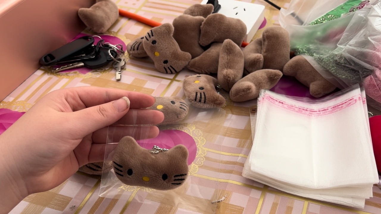 Parcel being packaged for shipping at a home workspace
